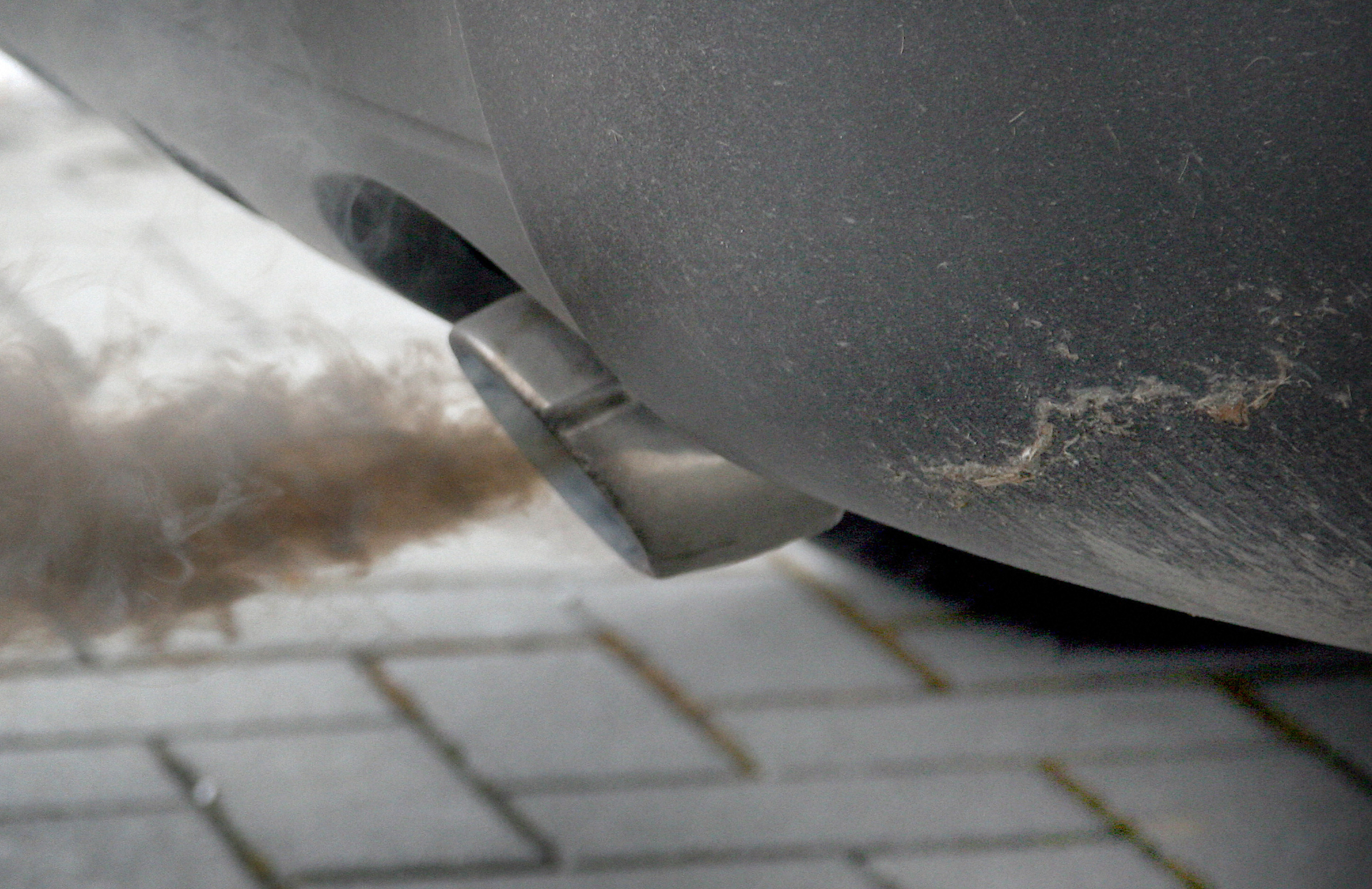 Vehicle diesel exhaust pipe during DPF inspection